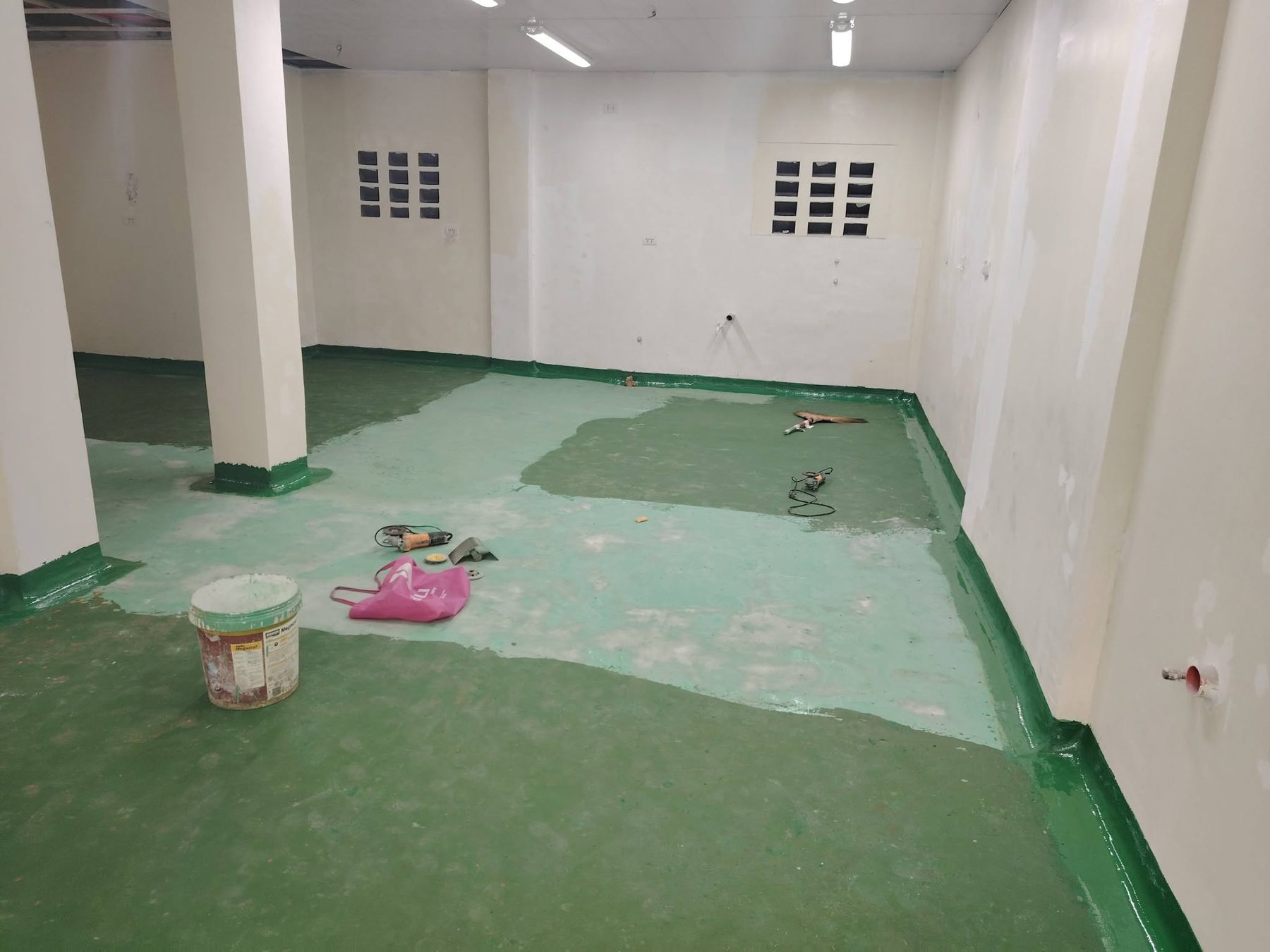 Epoxy floor coating in progress
